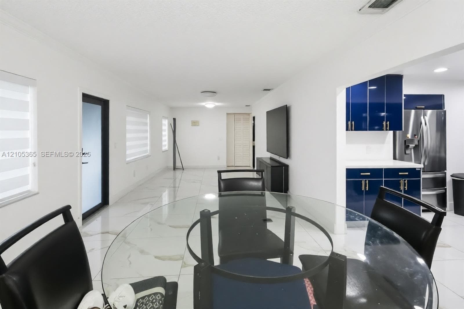 White tile flooring with veining