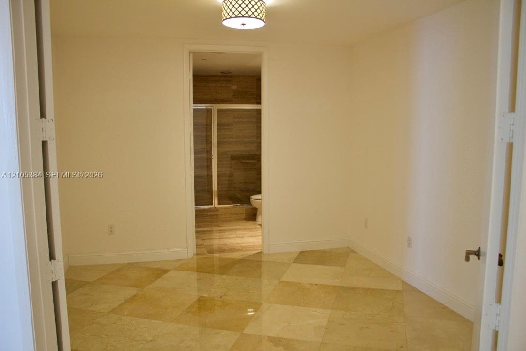 Checkerboard tile flooring with a polished finish