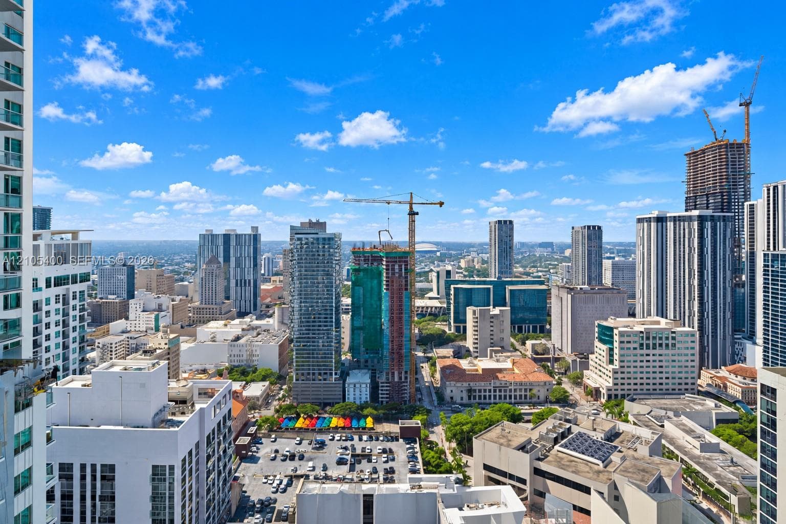 Expansive cityscape with a prominent skyline, showcasing diverse architectural styles and urban development