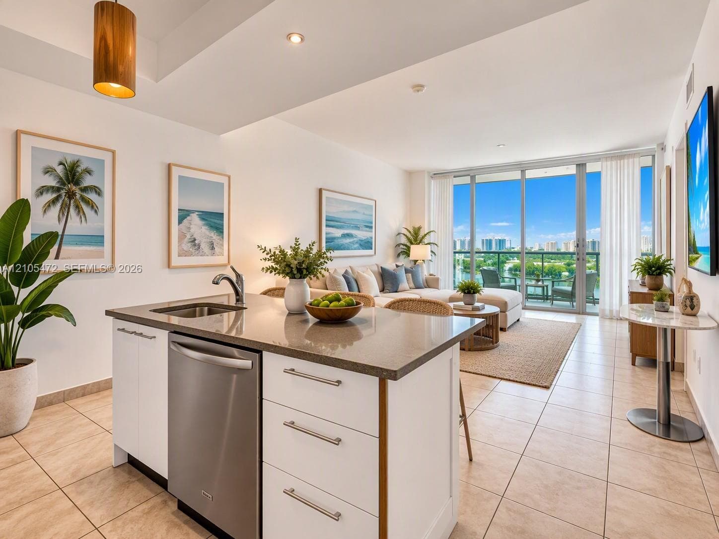 Kitchen island featuring a neutral-tone countertop, stainless steel dishwasher, and built-in cabinetry with metallic pulls-AI Virtual Stage Image