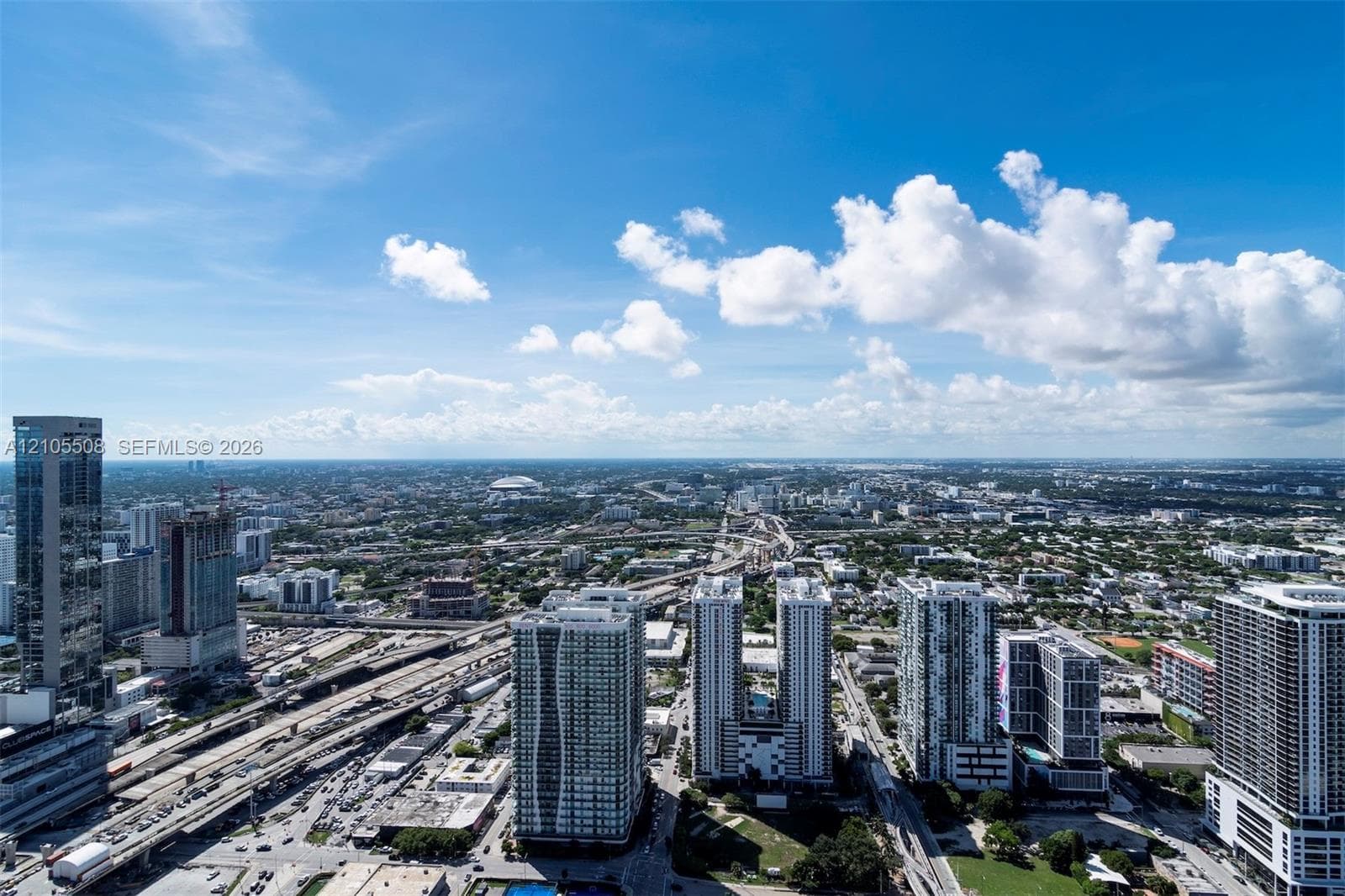 Expansive urban landscape with high-rise buildings and extensive transportation infrastructure