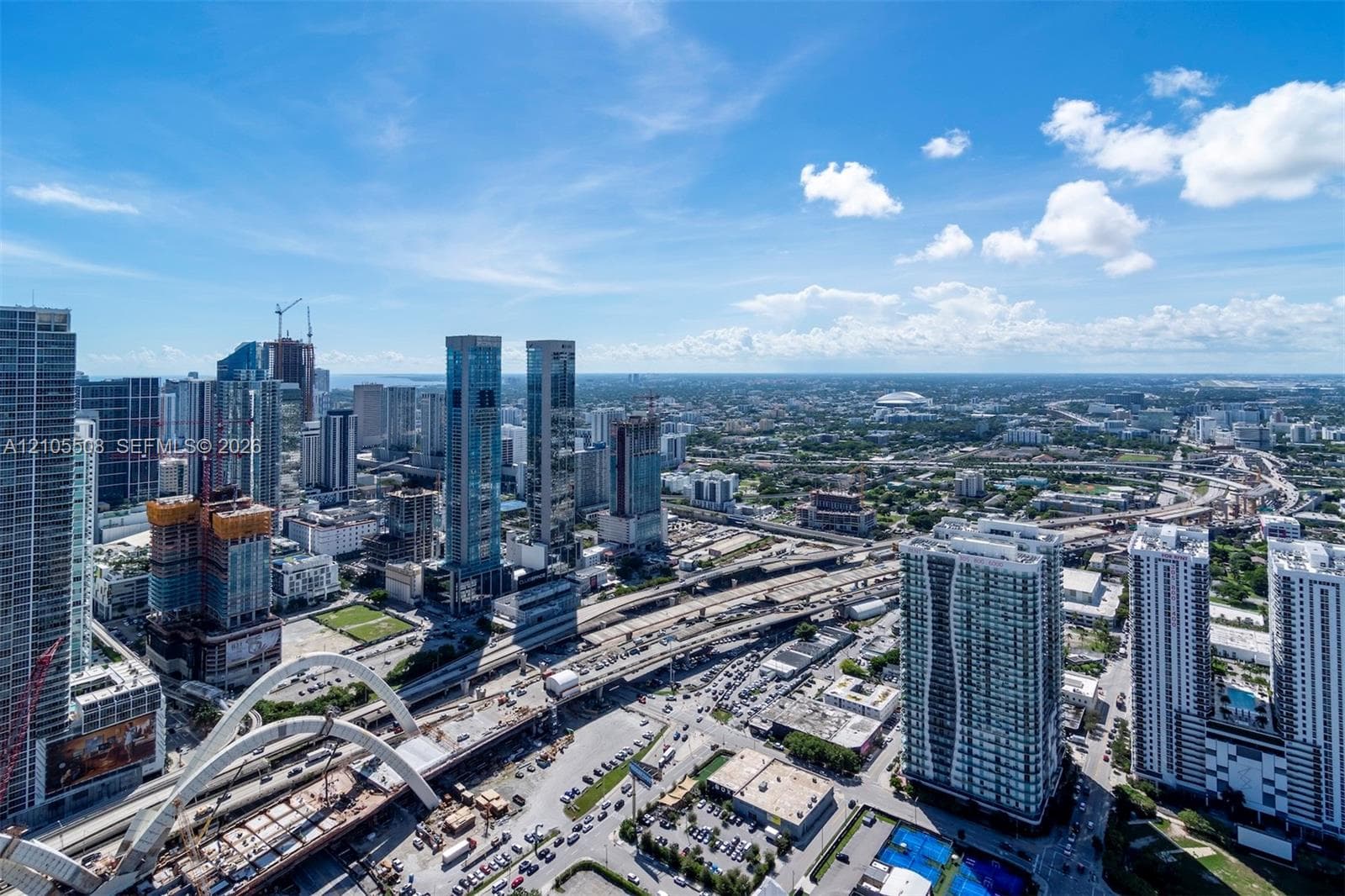 Expansive cityscape featuring high-rise buildings and infrastructure
