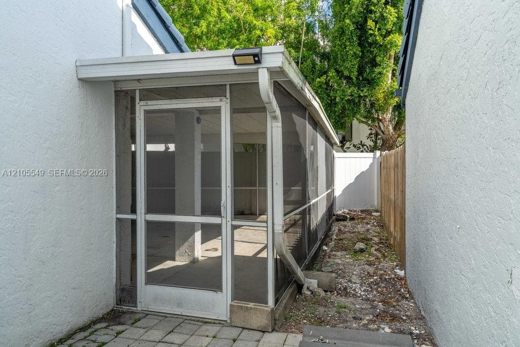 Screened enclosure with a concrete floor