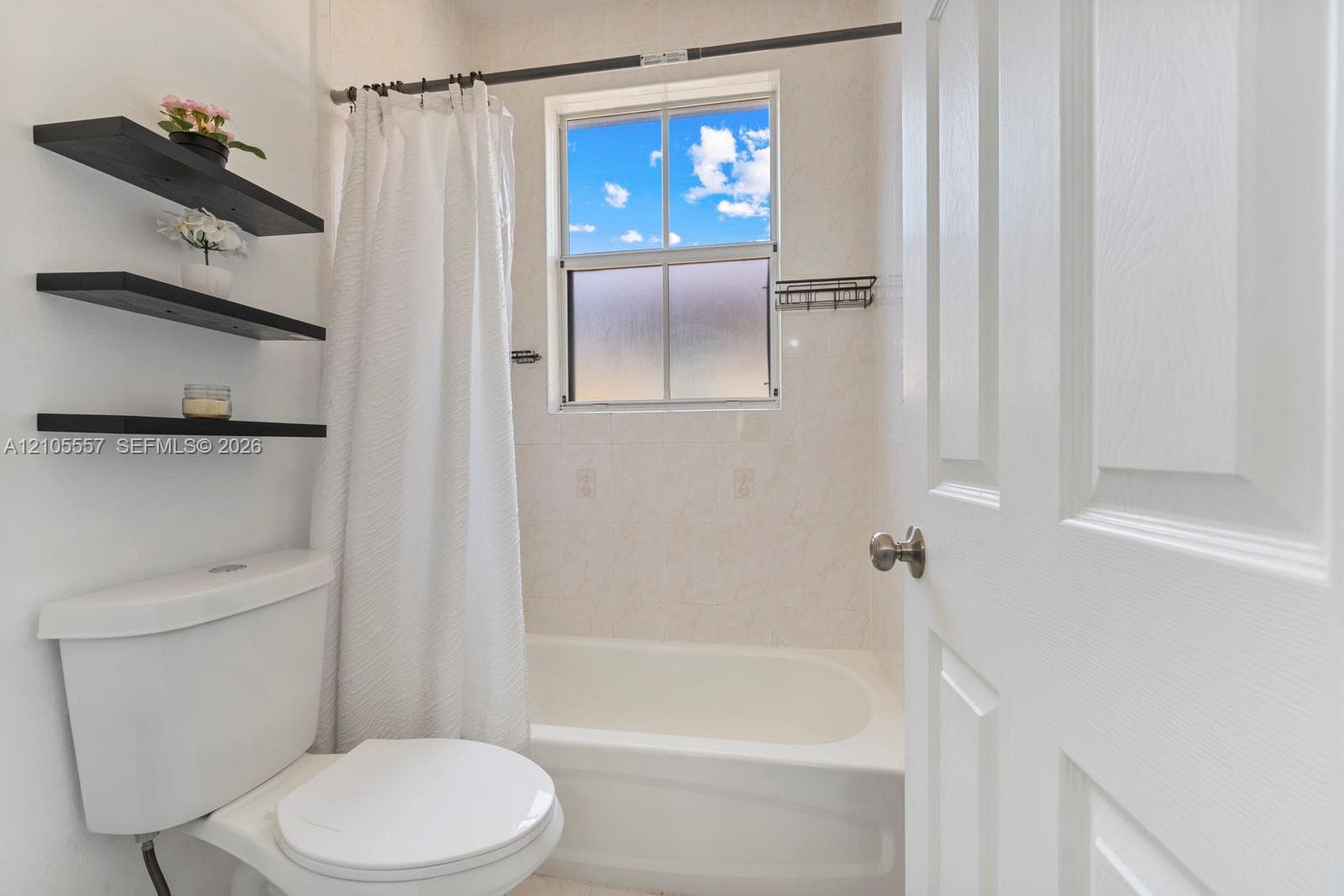 White paneled door with brushed nickel hardware