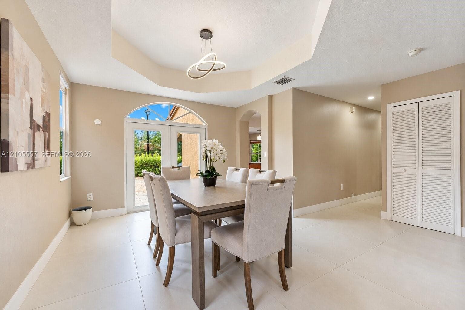 Tray ceiling with a modern pendant light fixture