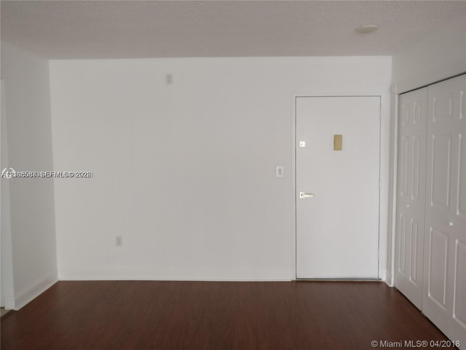 Wood-finish flooring with white walls