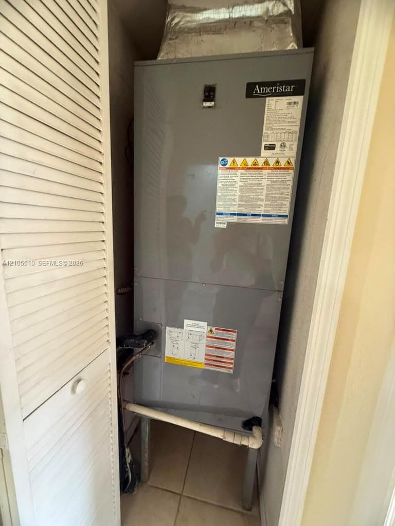 Ameristar climate control unit housed in a dedicated closet with louvered door access