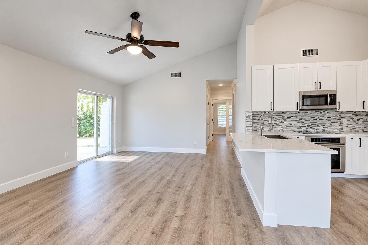 Bright Vacant Open-Plan Kitchen and Livi