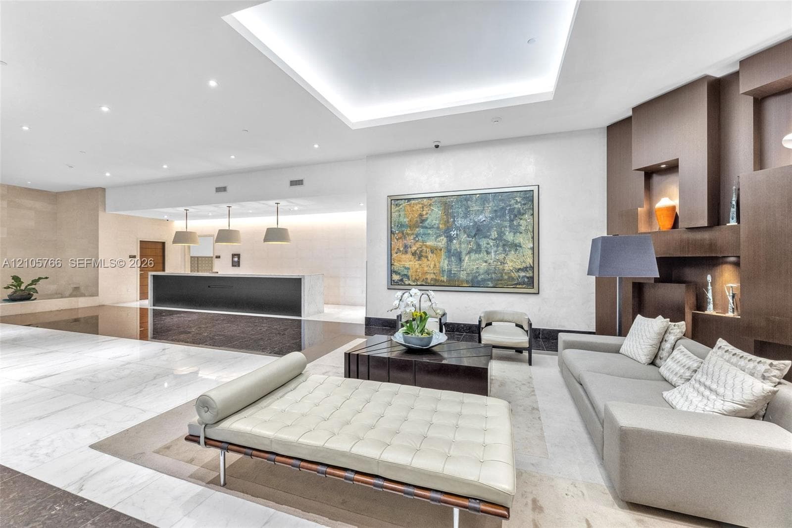 Residents' lobby with the front desk and a seating area.