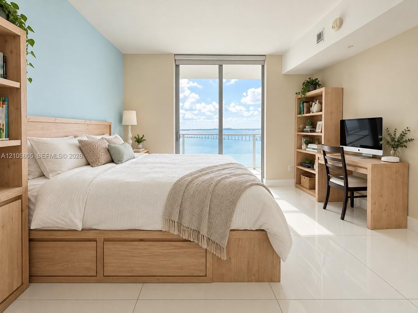 Room featuring large-format tile flooring, built-in wooden storage cabinetry, a wood-finish platform frame, and a sliding glass door opening to an exterior balcony