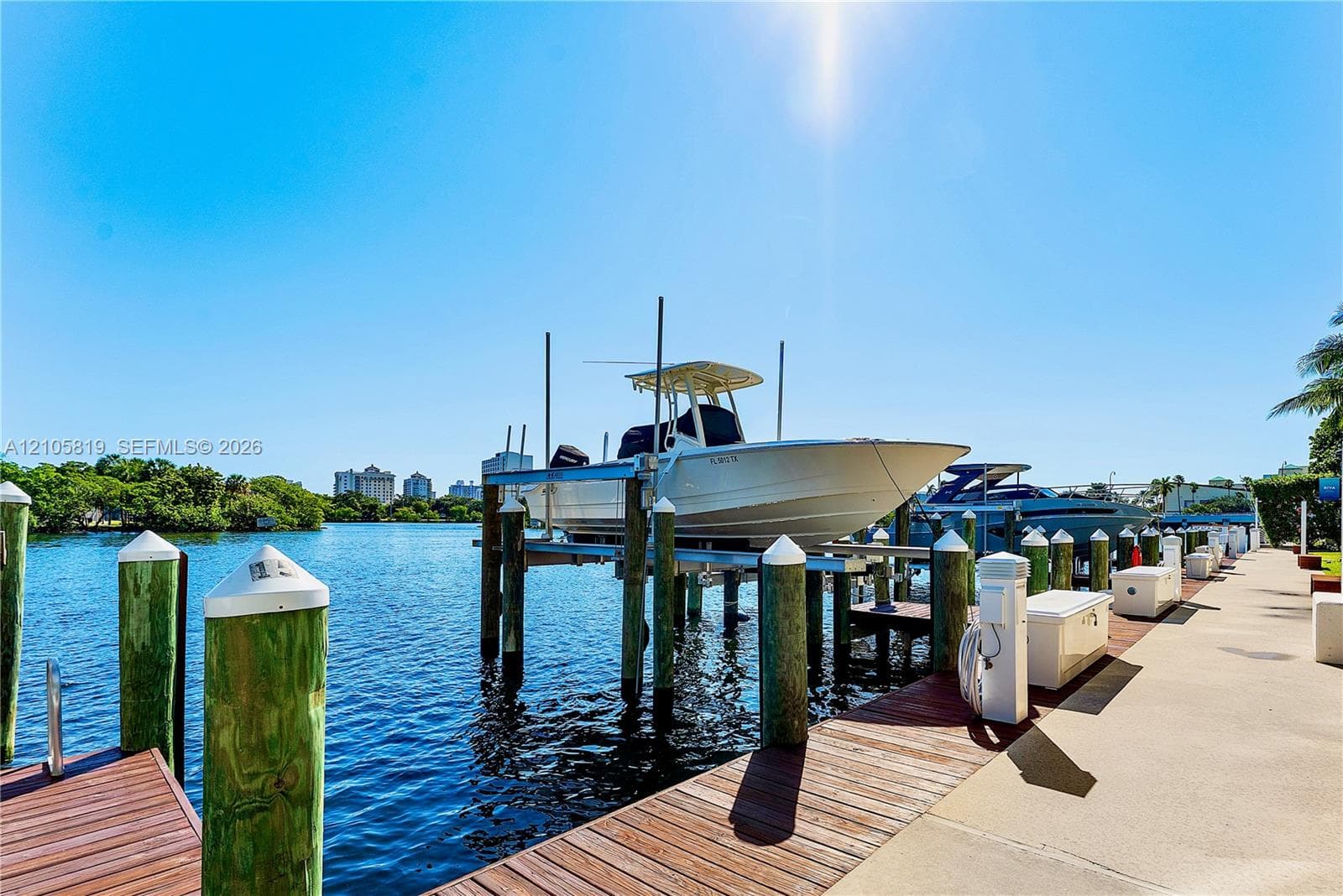 Boat Slip with Lift available for Additional Purchase.  12' Beam accommodating approximately 38' Center Console.  Water & Electricity are Provided.
