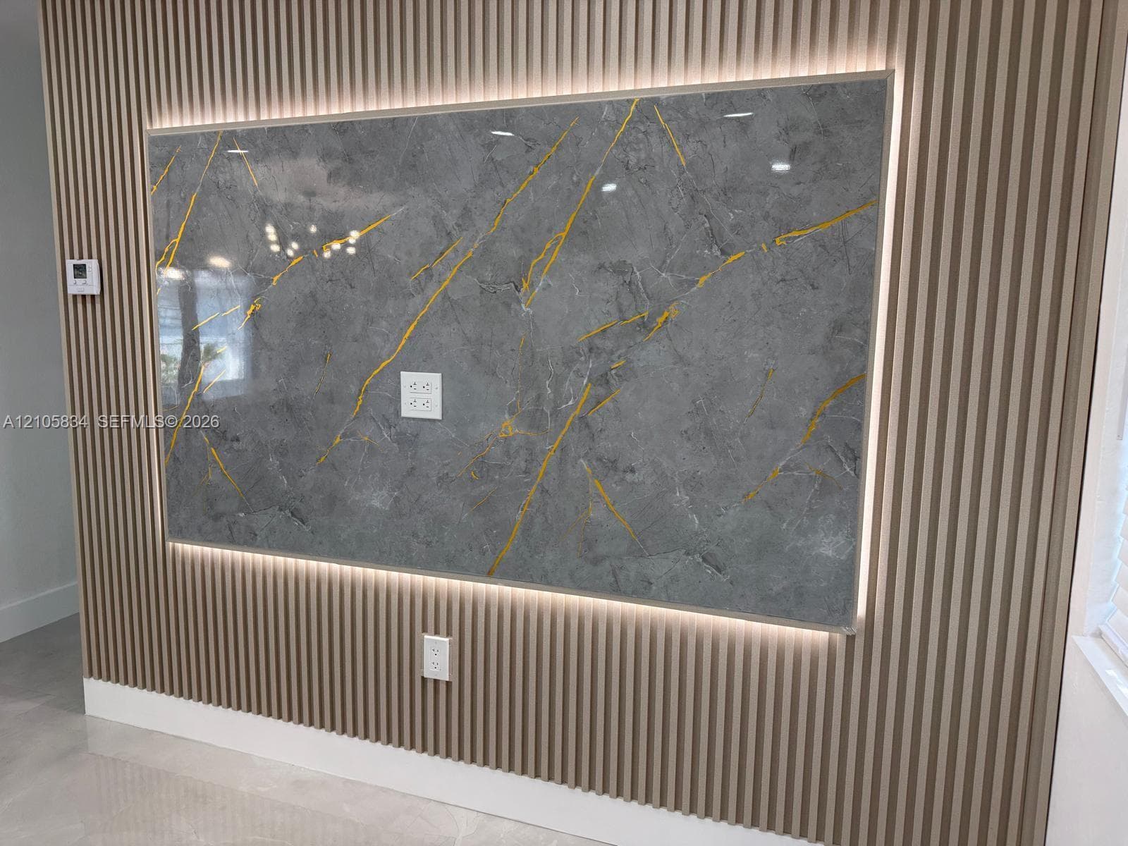 Property Feature Documentation. Displaying the wall finishes and integrated electrical components of the property