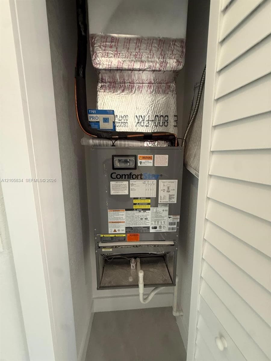 ComfortStar air handling unit featuring reflective duct insulation and louvered closet door enclosure