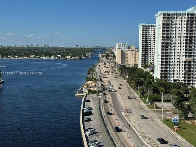 Waterfront exposure, high-rise architectural context, and coastal landscape