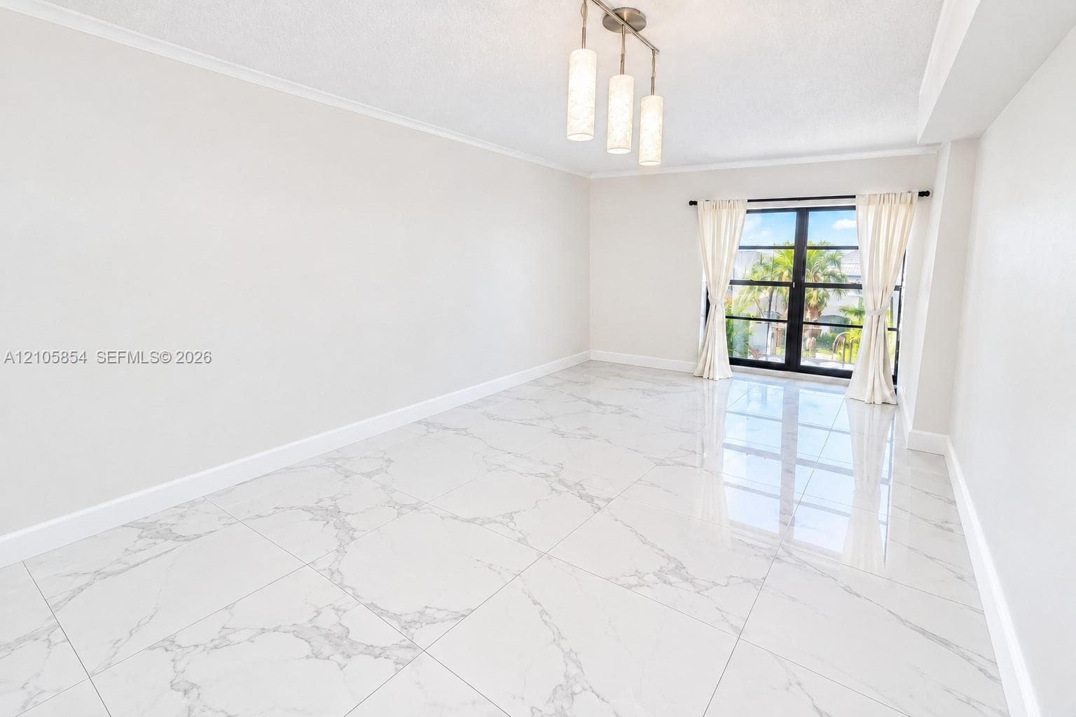 Edited image showing how the room would look without furniture, highlighting its spacious layout, beautiful flooring and stunning lake view.