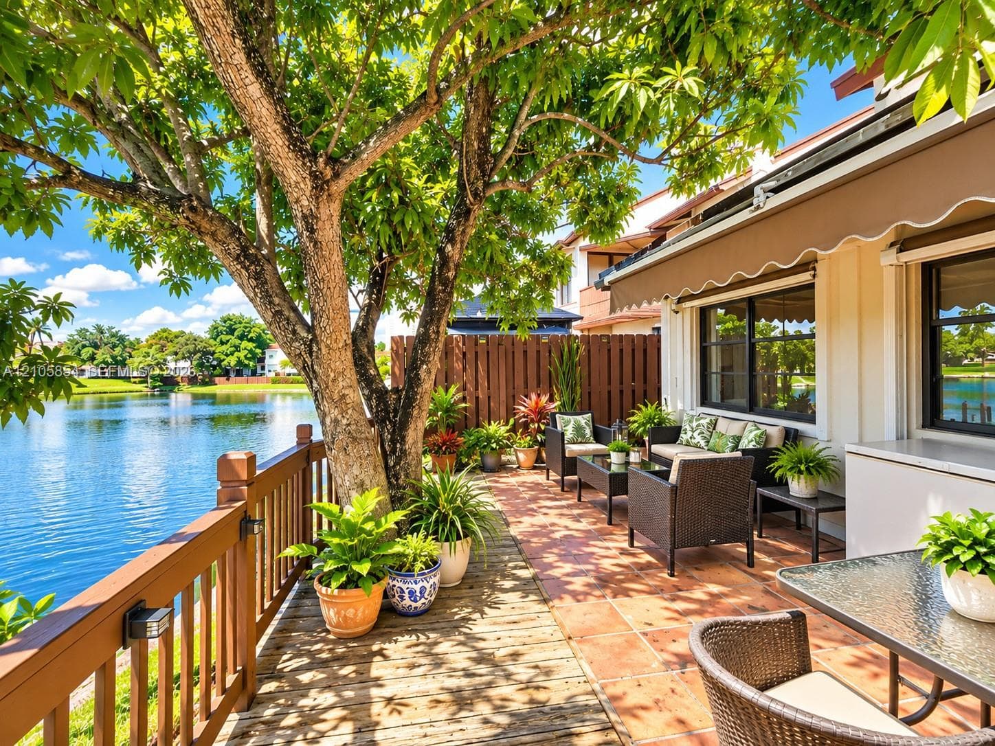 Paved patio and lakefront deck, perfect for outdoor dining, entertaining, or relaxing while enjoying peaceful water views.