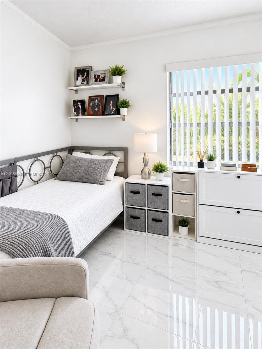 A first-floor bedroom and full bathroom provide flexibility for guests, family, or a home office