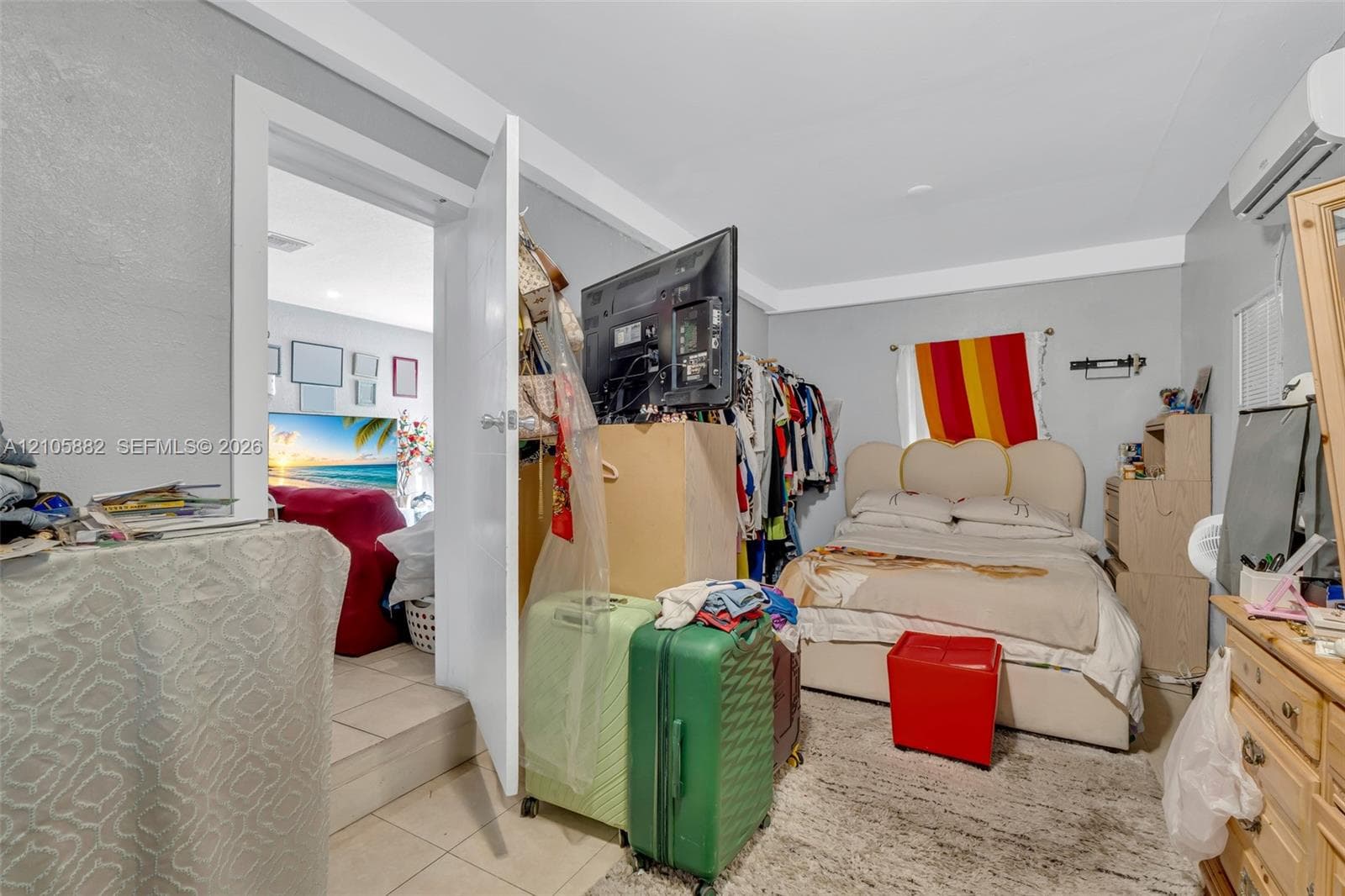 Wall-mounted ductless air conditioning unit