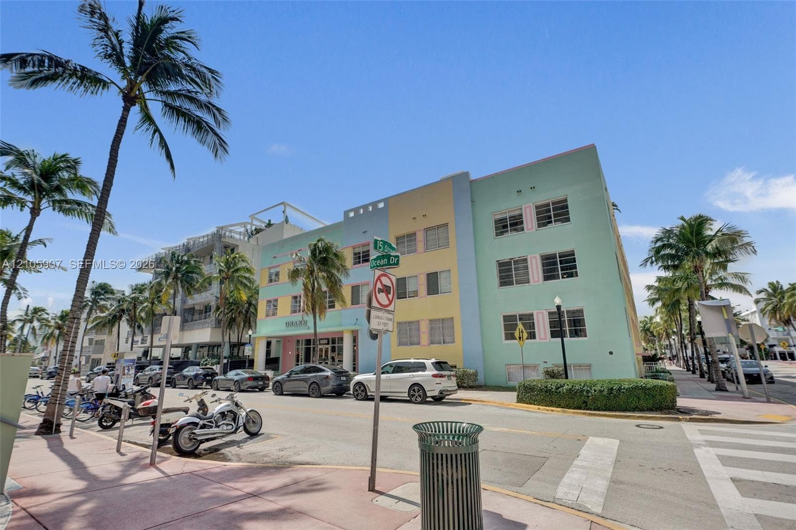 Art Deco exterior featuring a multi-story pastel façade and linear geometric detailing