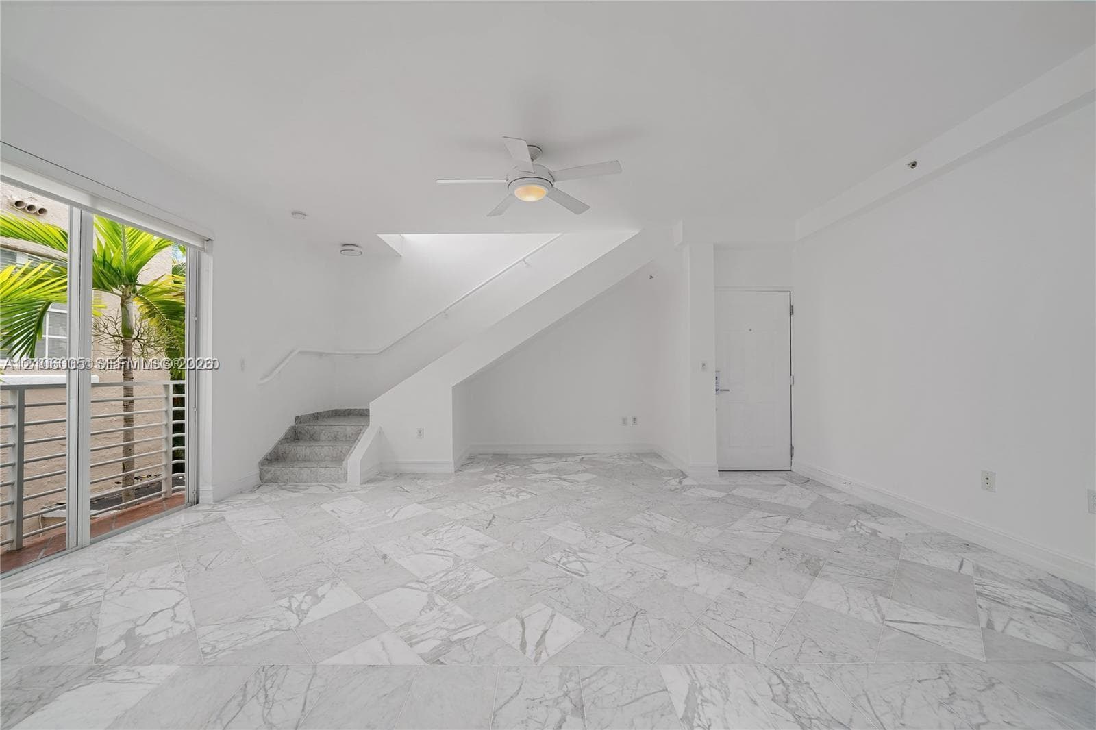section under stairs is currently closed into a closet for convenient storage!