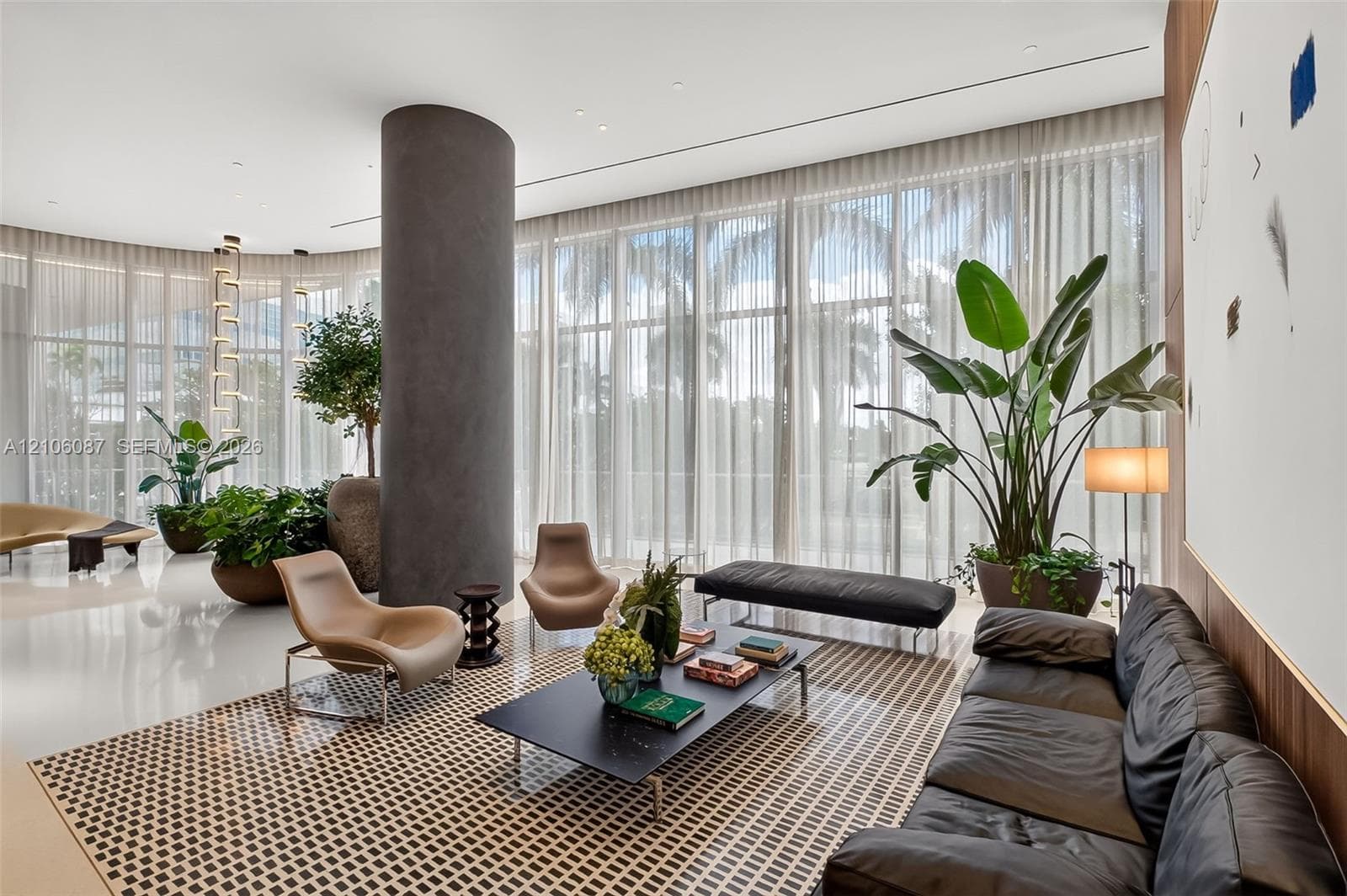 Floor-to-ceiling glass walls, expansive polished stone flooring, central structural pillar with smooth matte finish, and integrated recessed lighting
