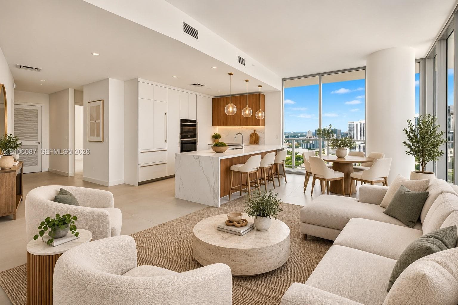 Open-concept kitchen featuring an island with a stone countertop, floor-to-ceiling windows, custom cabinetry, built-in stainless steel double ovens, and recessed lighting