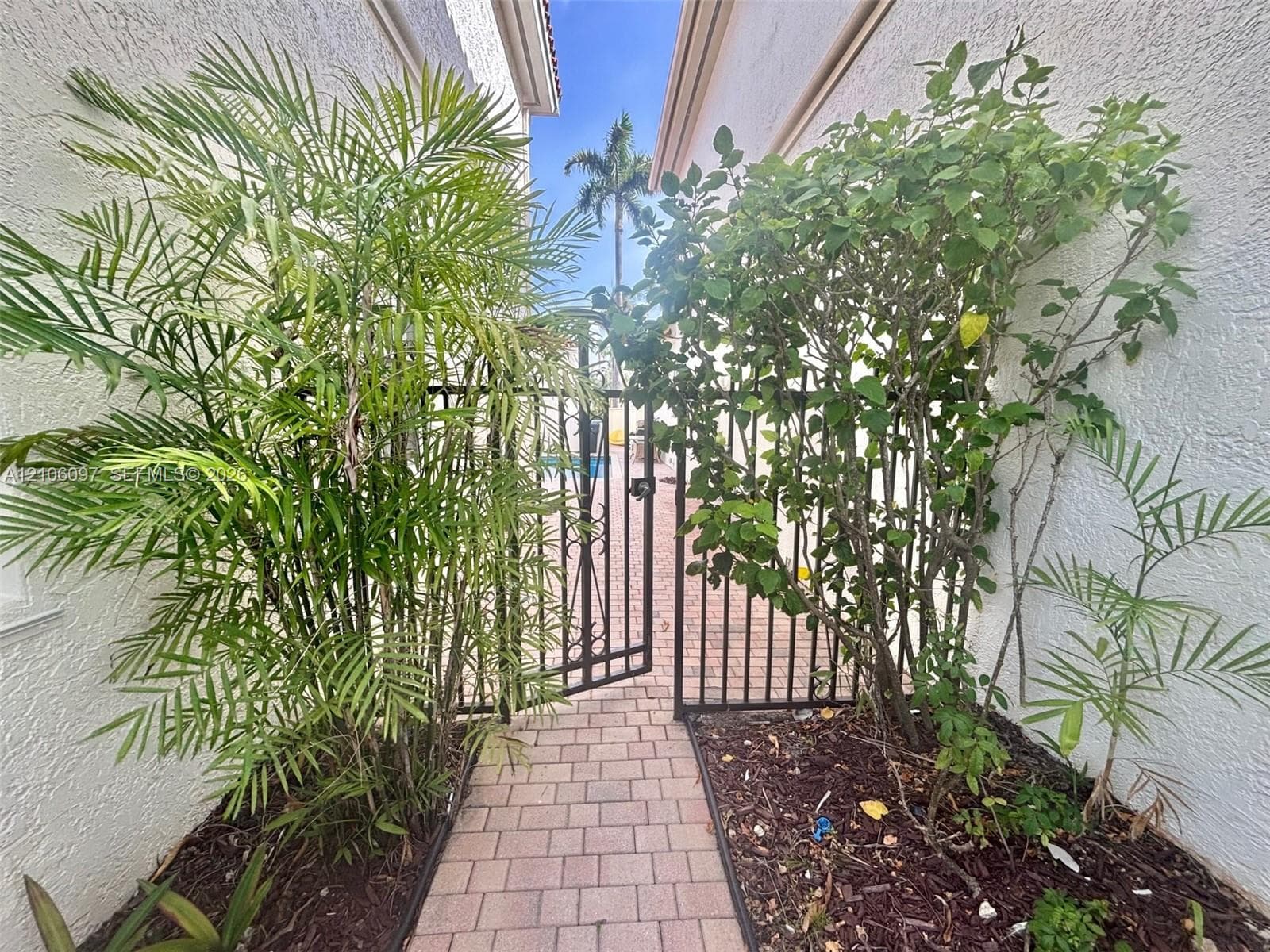 Side entry leading to the boat dock, back area