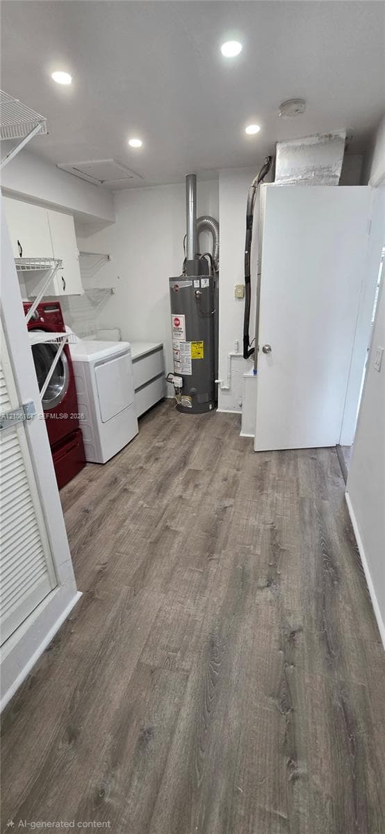 Utility room featuring wood-finish flooring, recessed lighting, white wall-mounted cabinetry, and open shelving