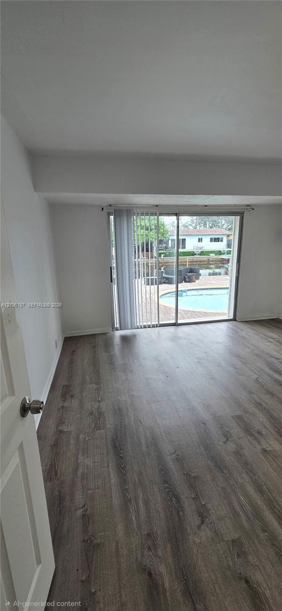Wood-finish flooring, sliding glass door, and swimming pool access