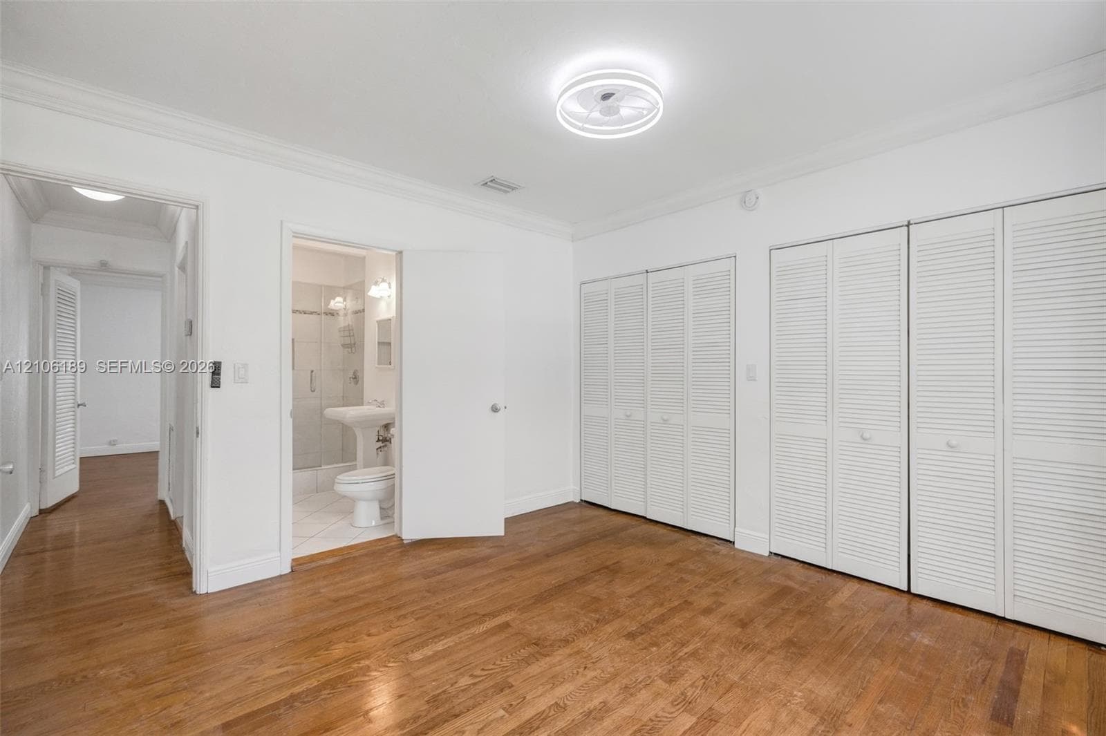 2nd ensuite and view of the hallway toward the 1st ensuite (master)