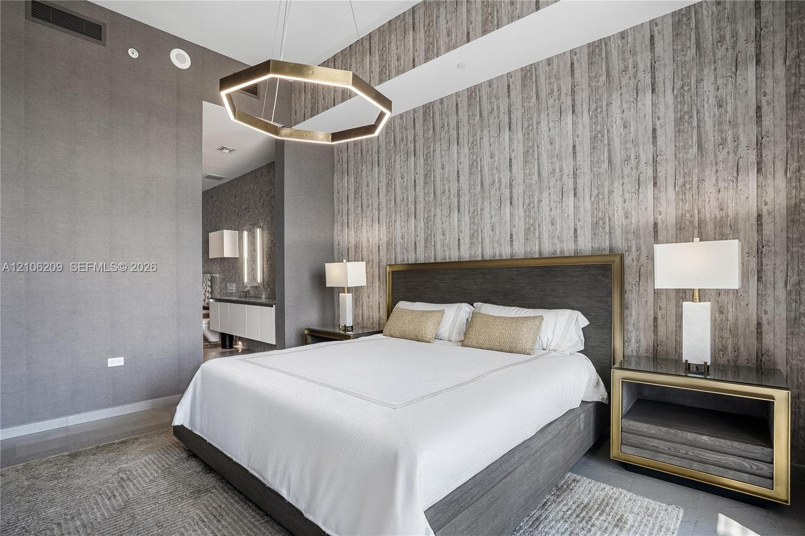Textured vertical wall treatment, hexagonal geometric pendant light, and recessed ceiling lighting