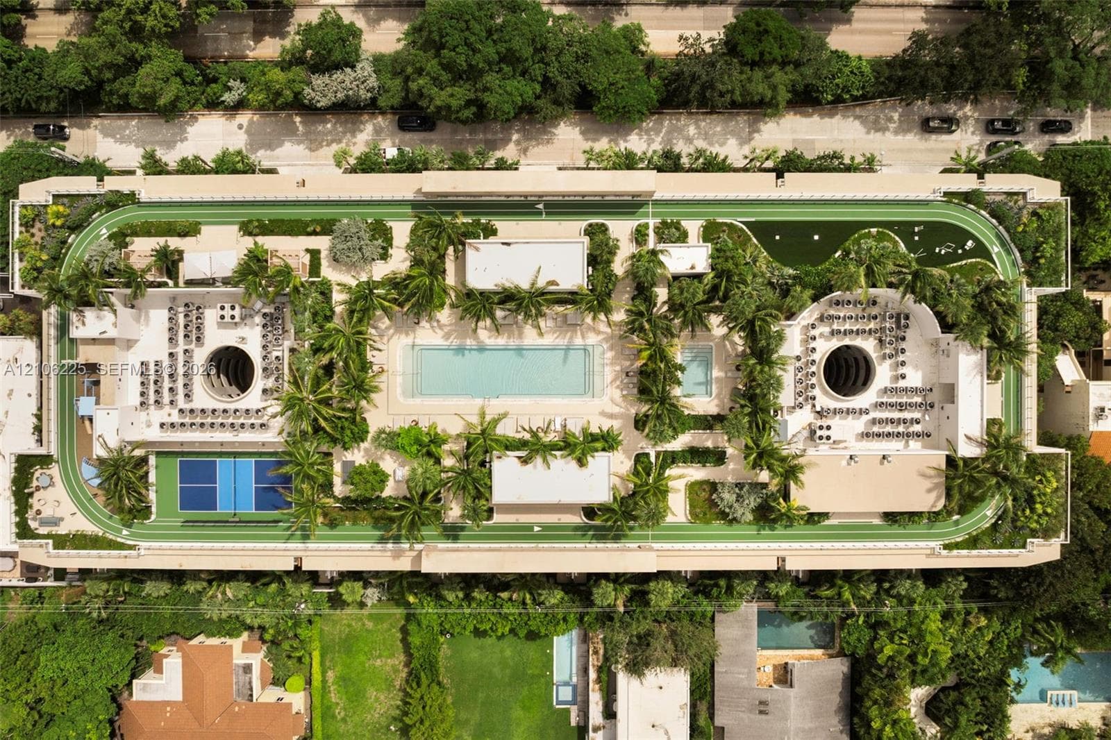Rooftop amenities featuring a swimming pool, jogging track, landscaped gardens, and a sport court