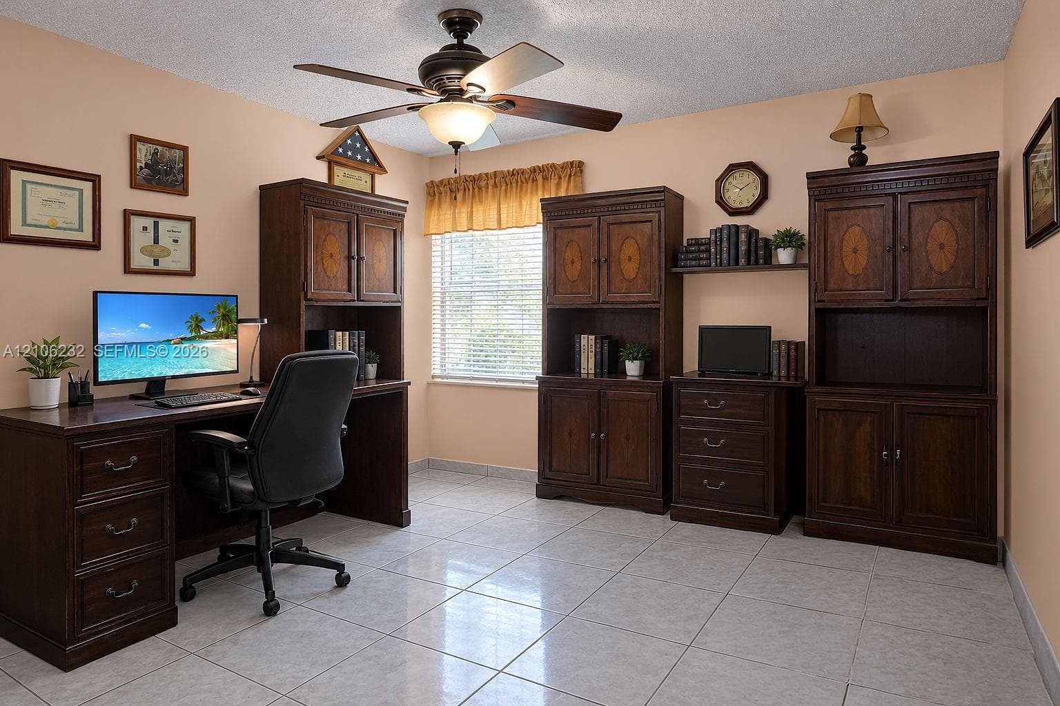 Room featuring light-toned tile flooring, neutral wall paint, a multi-blade ceiling fan with integrated lighting, and horizontal window blinds
