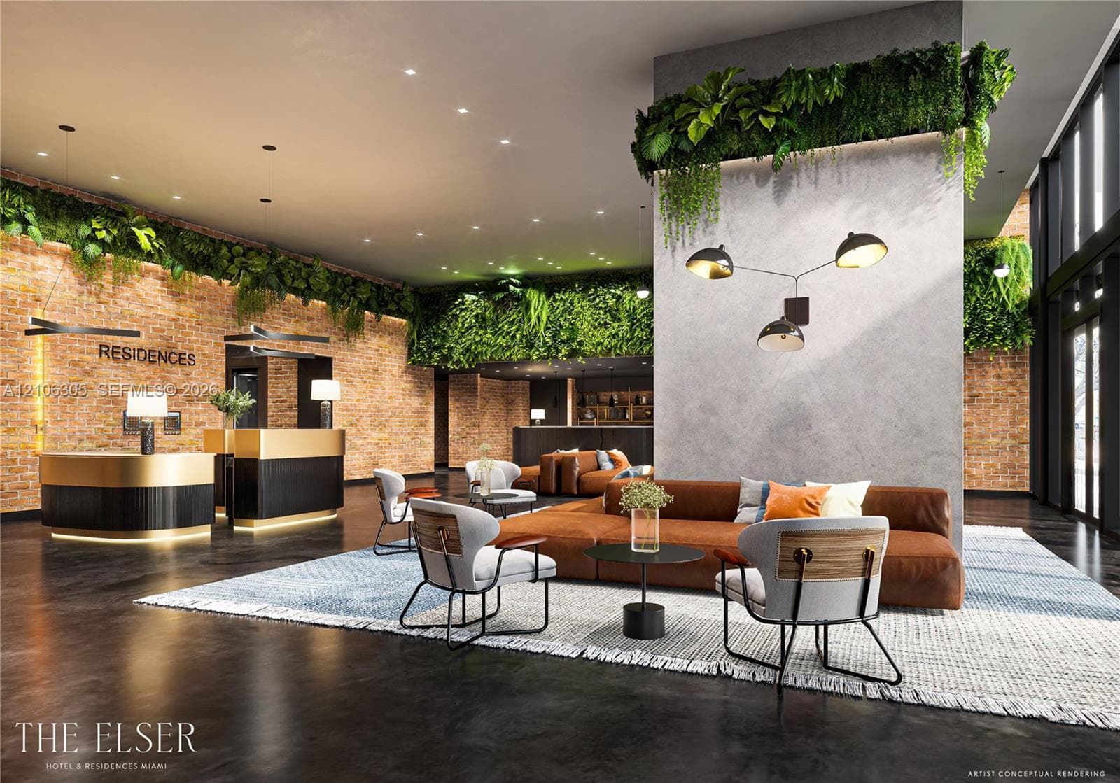Lobby featuring exposed brick walls, a smooth concrete accent pillar, integrated vertical greenery, recessed ceiling lighting, and polished dark flooring