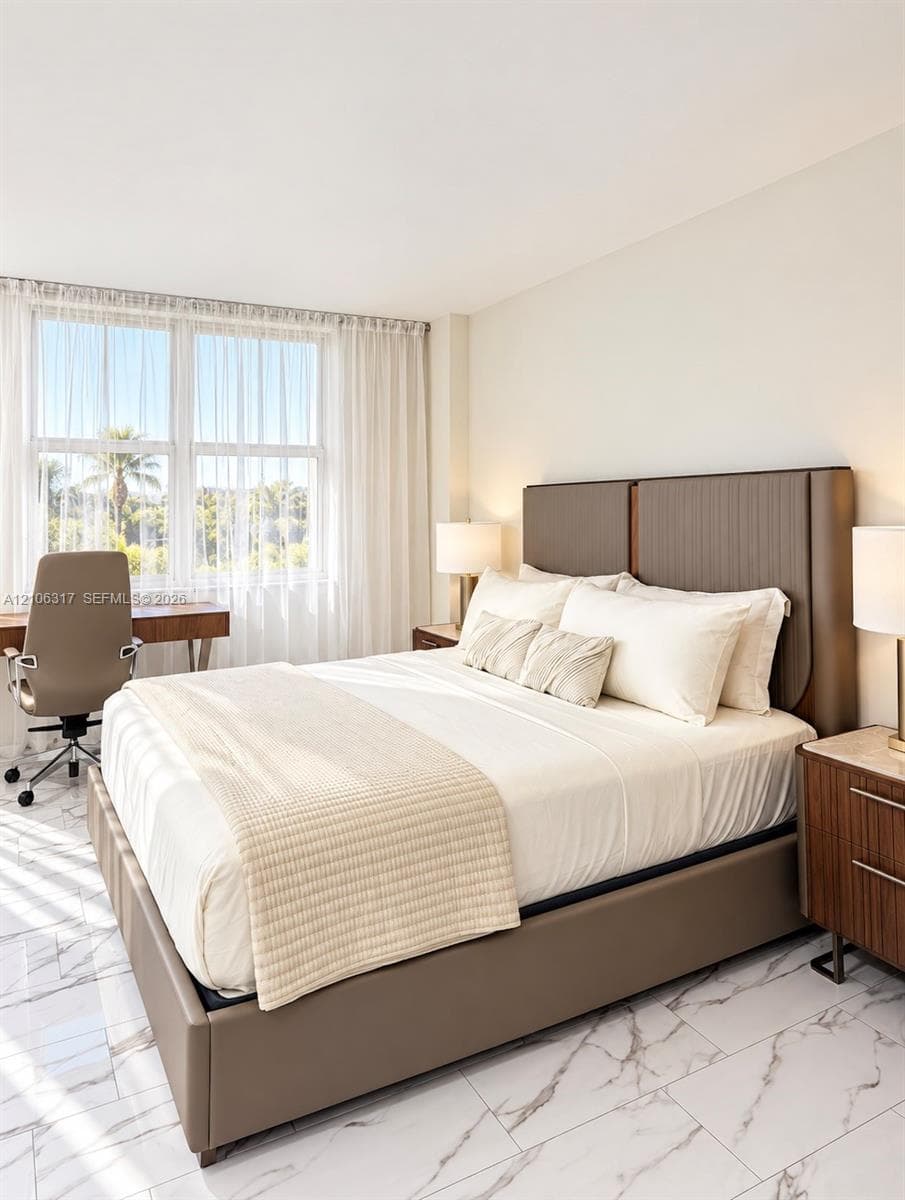 Polished stone-look tile flooring and expansive double-pane windows