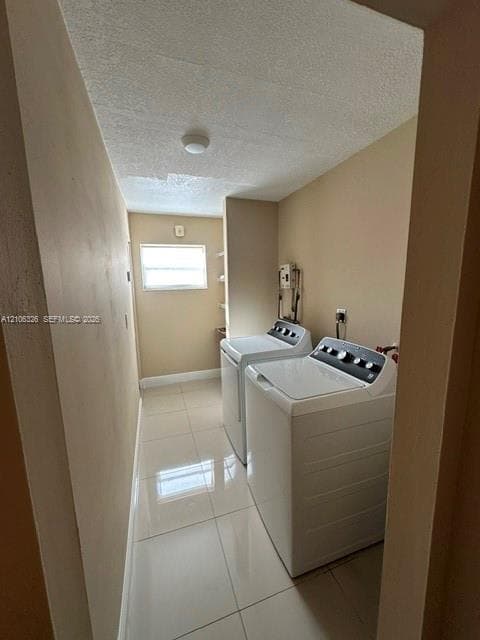 Utility area featuring large-format ceramic tile flooring, a window, and wall-mounted shelving