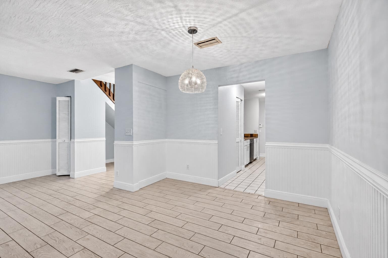 Unfurnished dining area with staircase-1