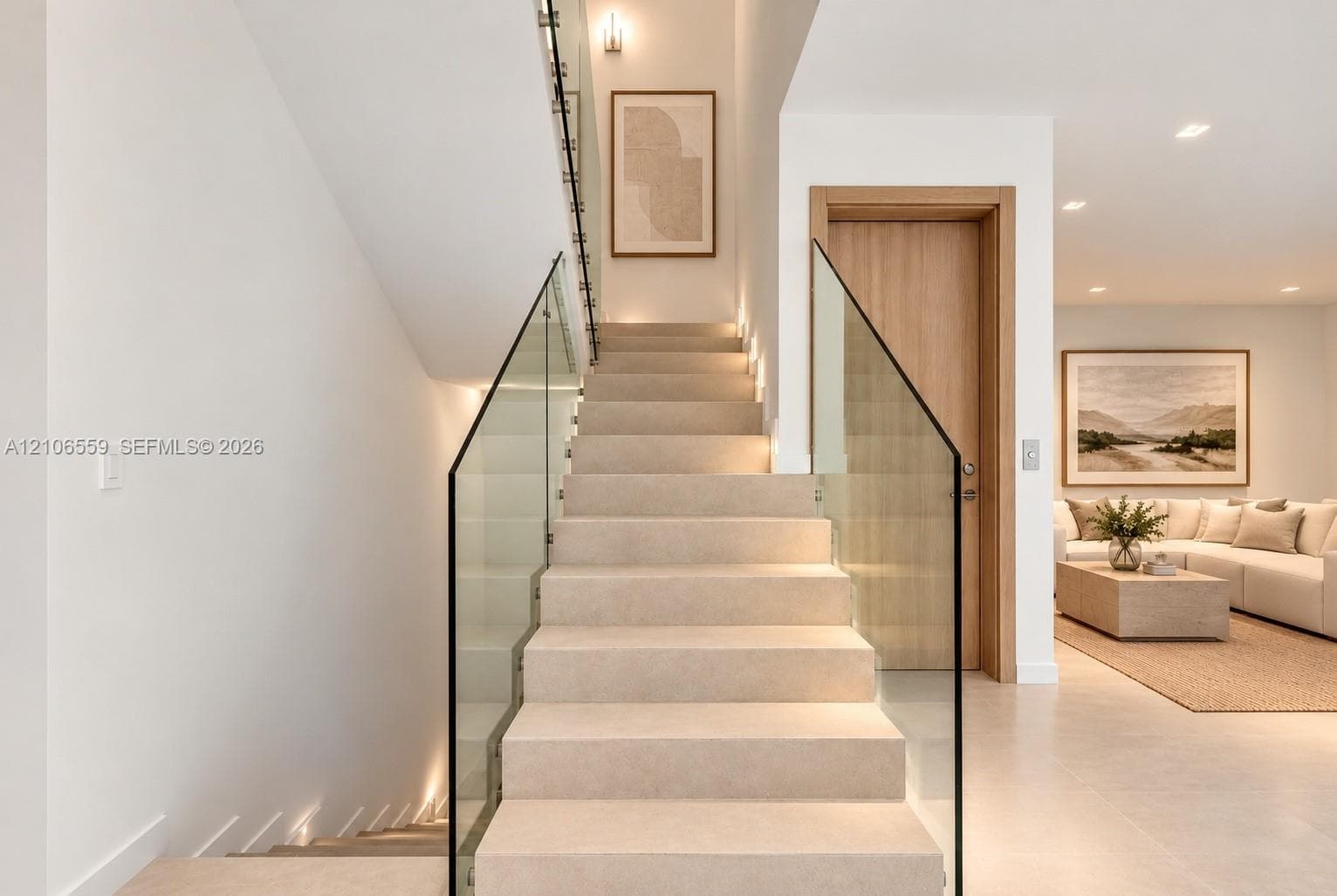 AI staged Staircase featuring stone-finish treads, glass panel railings, wall-integrated recessed lighting, and a light-toned wood-finish door