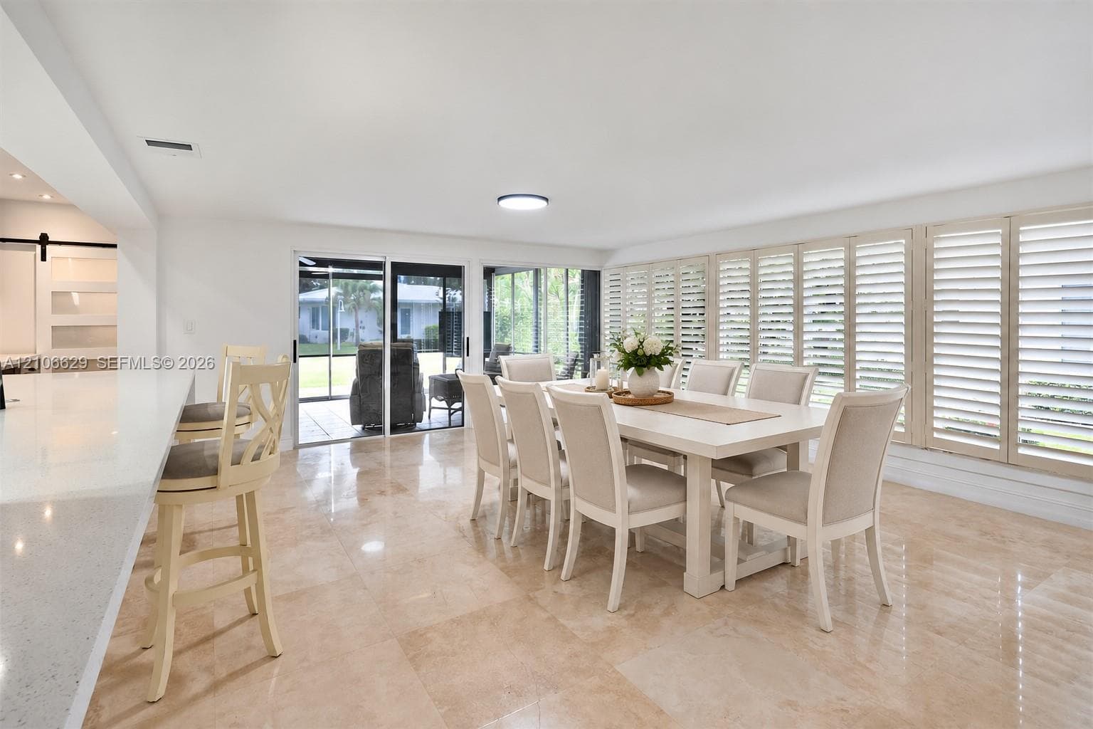 Staged 2nd dining area, could also be ?
