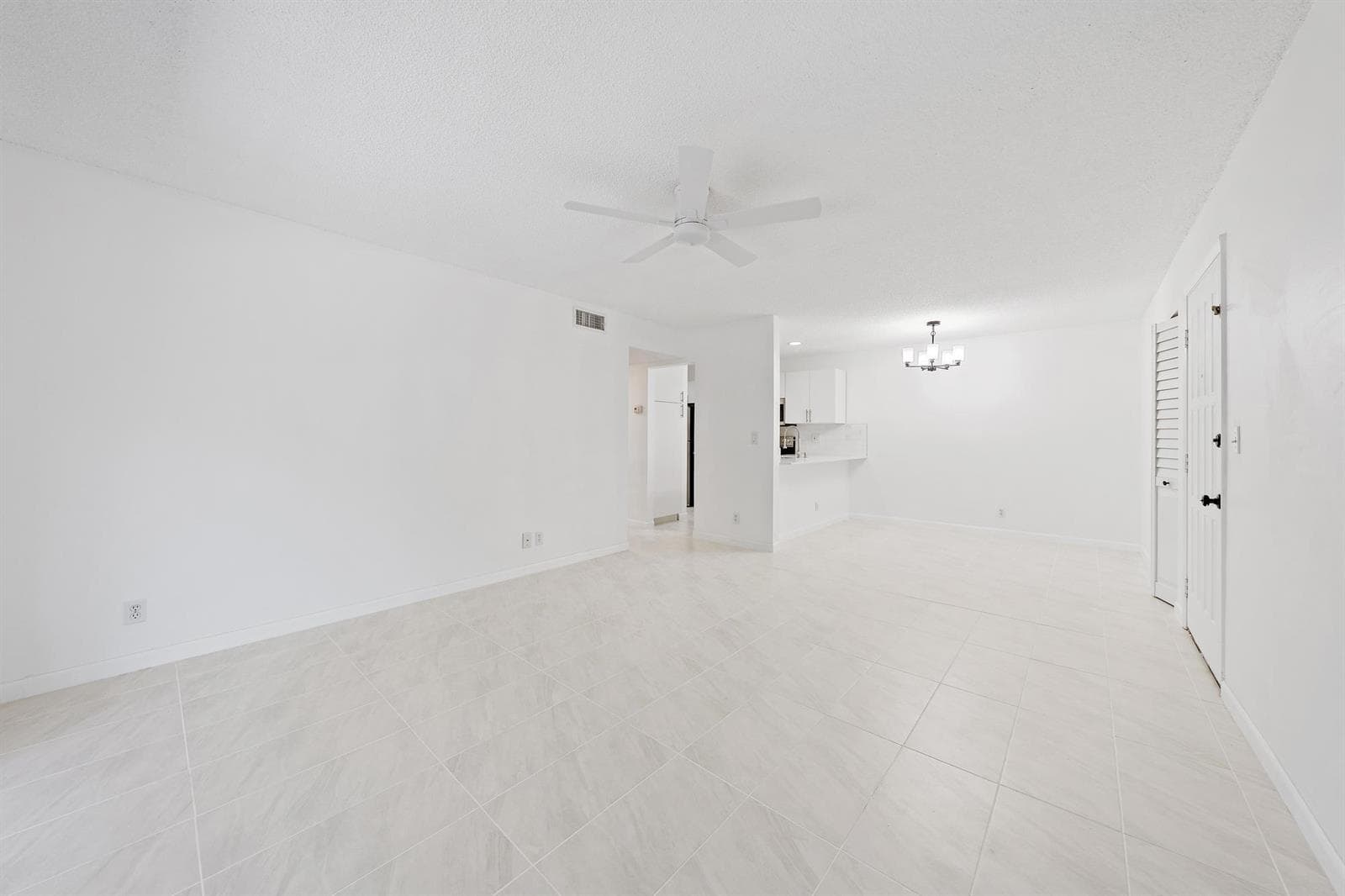 3402 Gardens E Dr Living to Kitchen