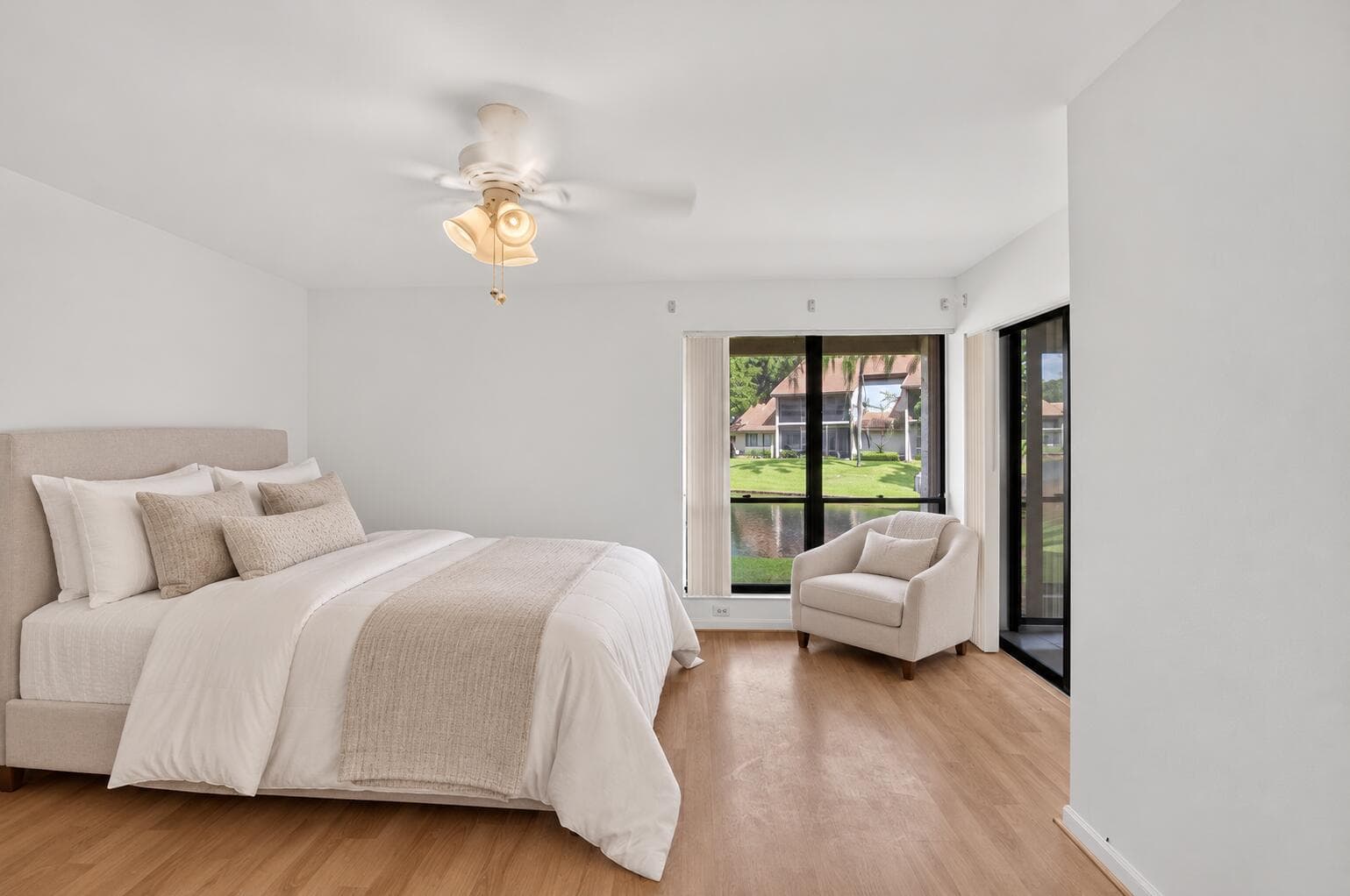 Serene lakeview bedroom with upholstered
