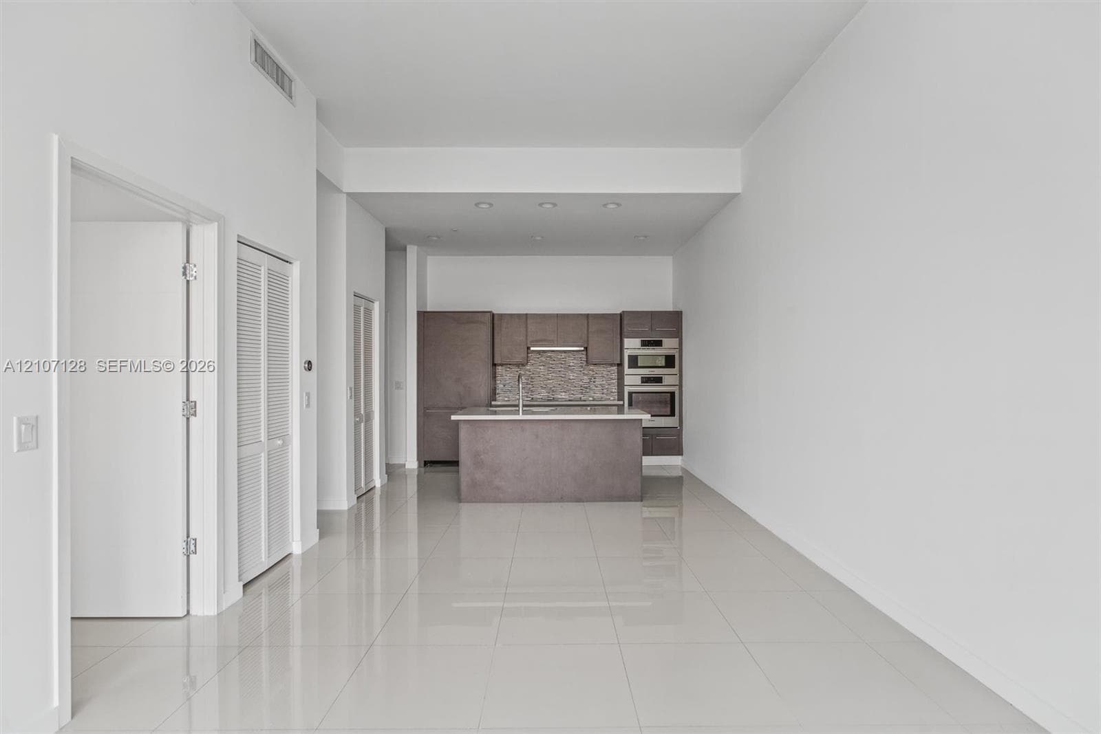 Living & Kitchen area seen from balcony door