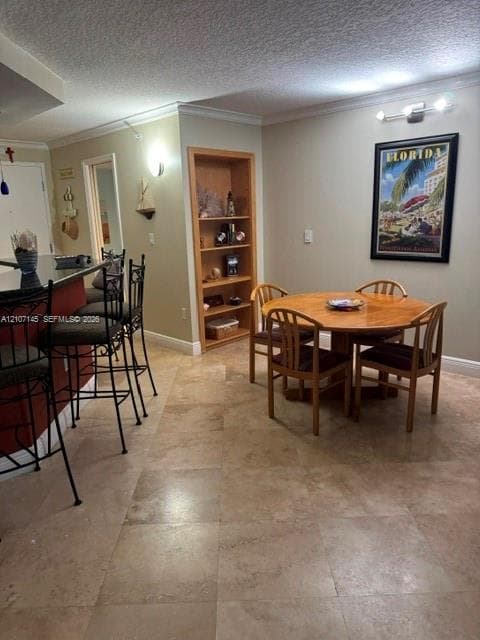 Neutral tile flooring, built-in recessed shelving with wood trim, and a breakfast bar with stone-surfaced countertop