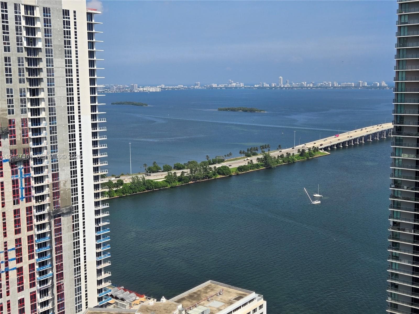 Elevated vantage point featuring expansive coastal, bridge, and cityscape scenery