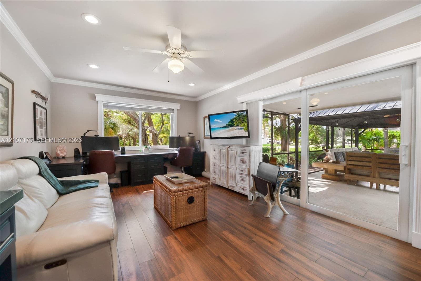 Bright and open Family Room off Kitchen. Currently doubles as an office.