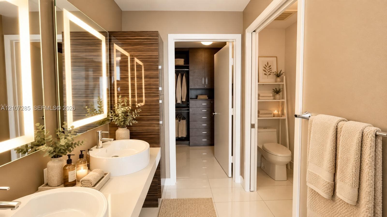 Dual vanity featuring white vessel sinks, quartz countertops, polished metal faucets, and integrated LED-lit mirrors, complemented by floor-to-ceiling wood-finish cabinetry and a walk-in closet with built-in storage ( AI used for interiors )