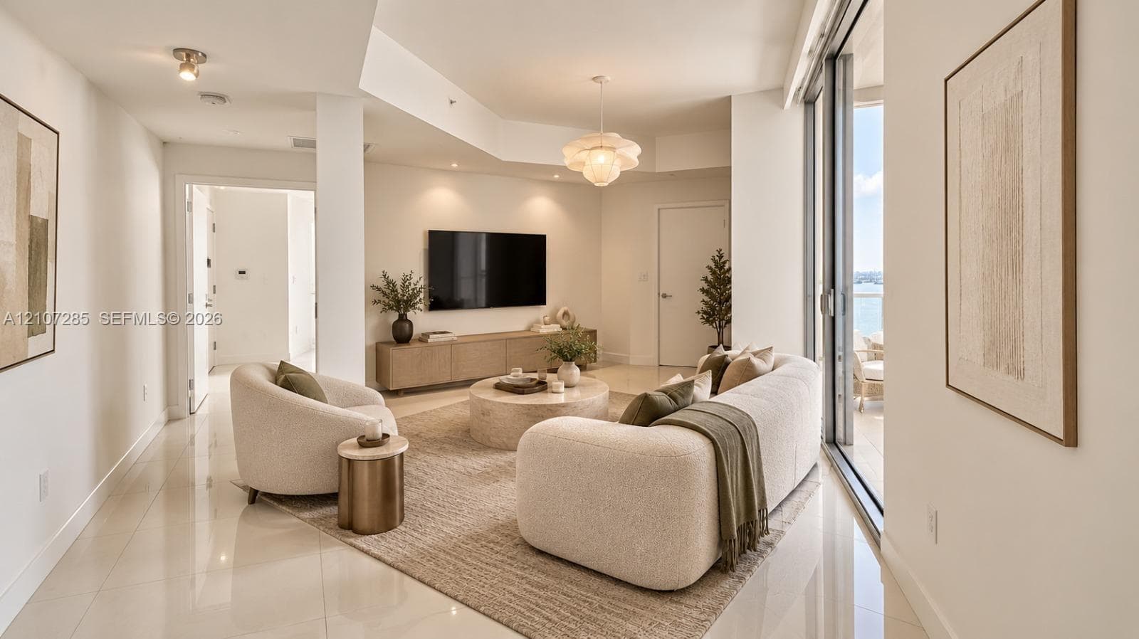 Living area featuring polished tile flooring, recessed ceiling lighting, a decorative pendant fixture, and expansive sliding glass doors ( AI used for interiors )