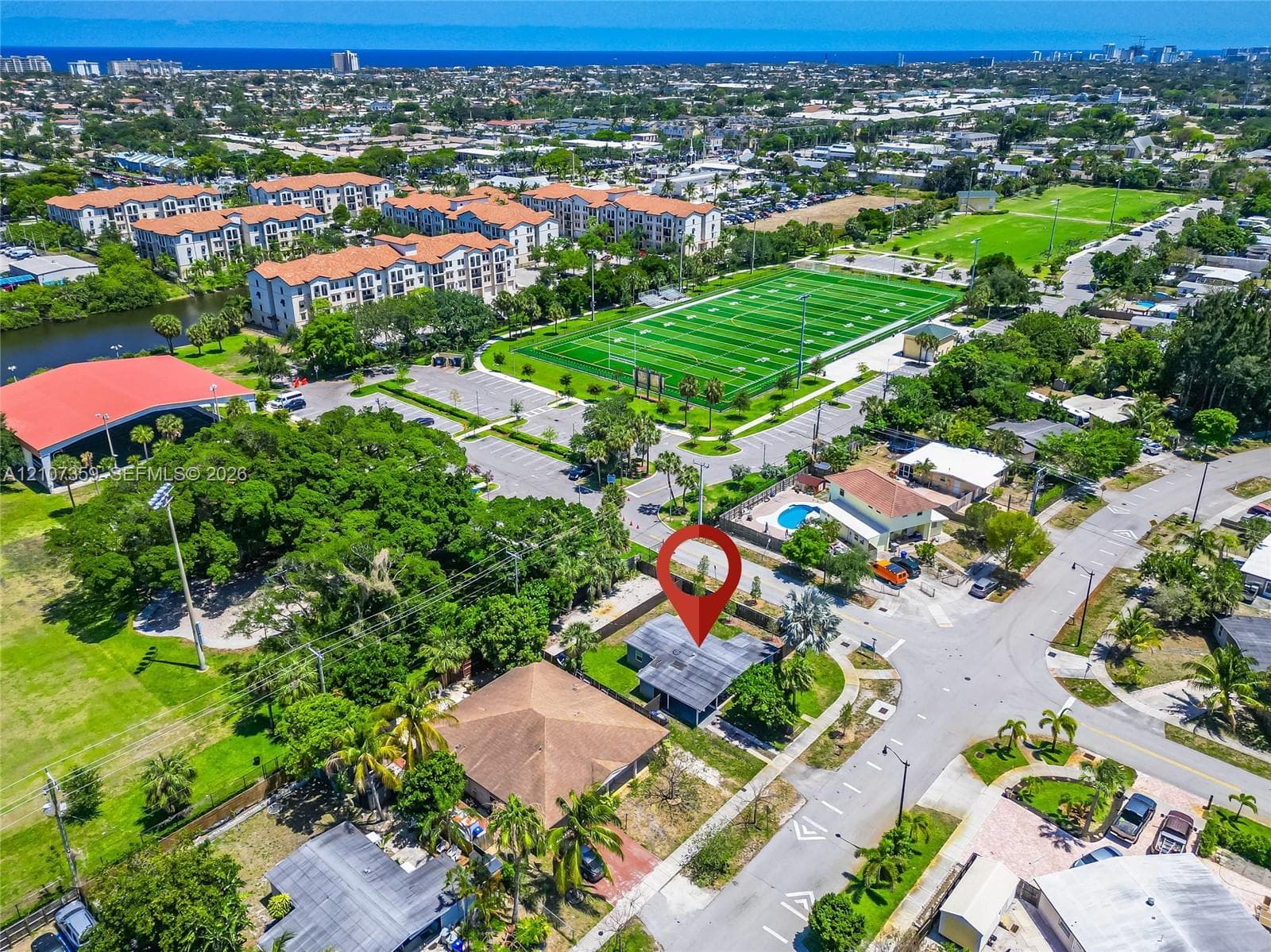 Wider aerial view providing additional context of the surrounding East Pompano Beach area.