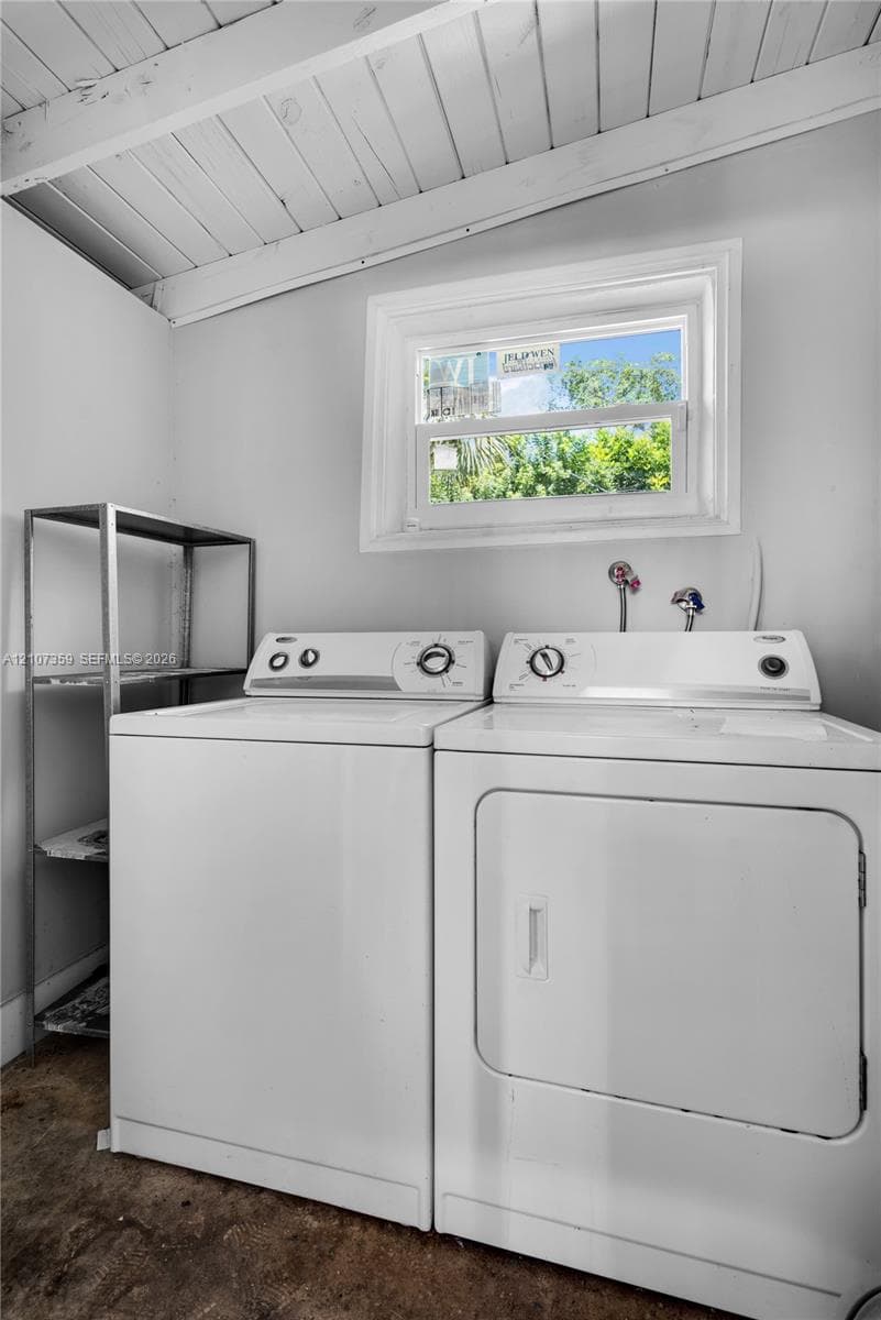 Dedicated laundry area with washer and dryer for everyday convenience.