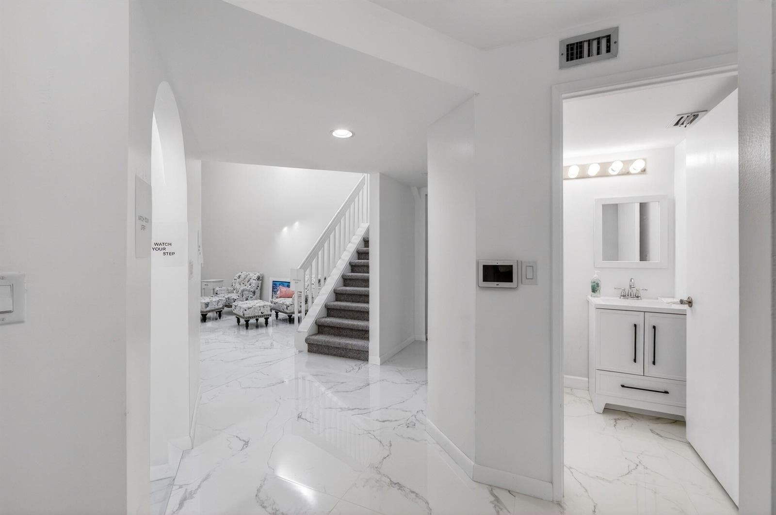 Foyer entry and half bath